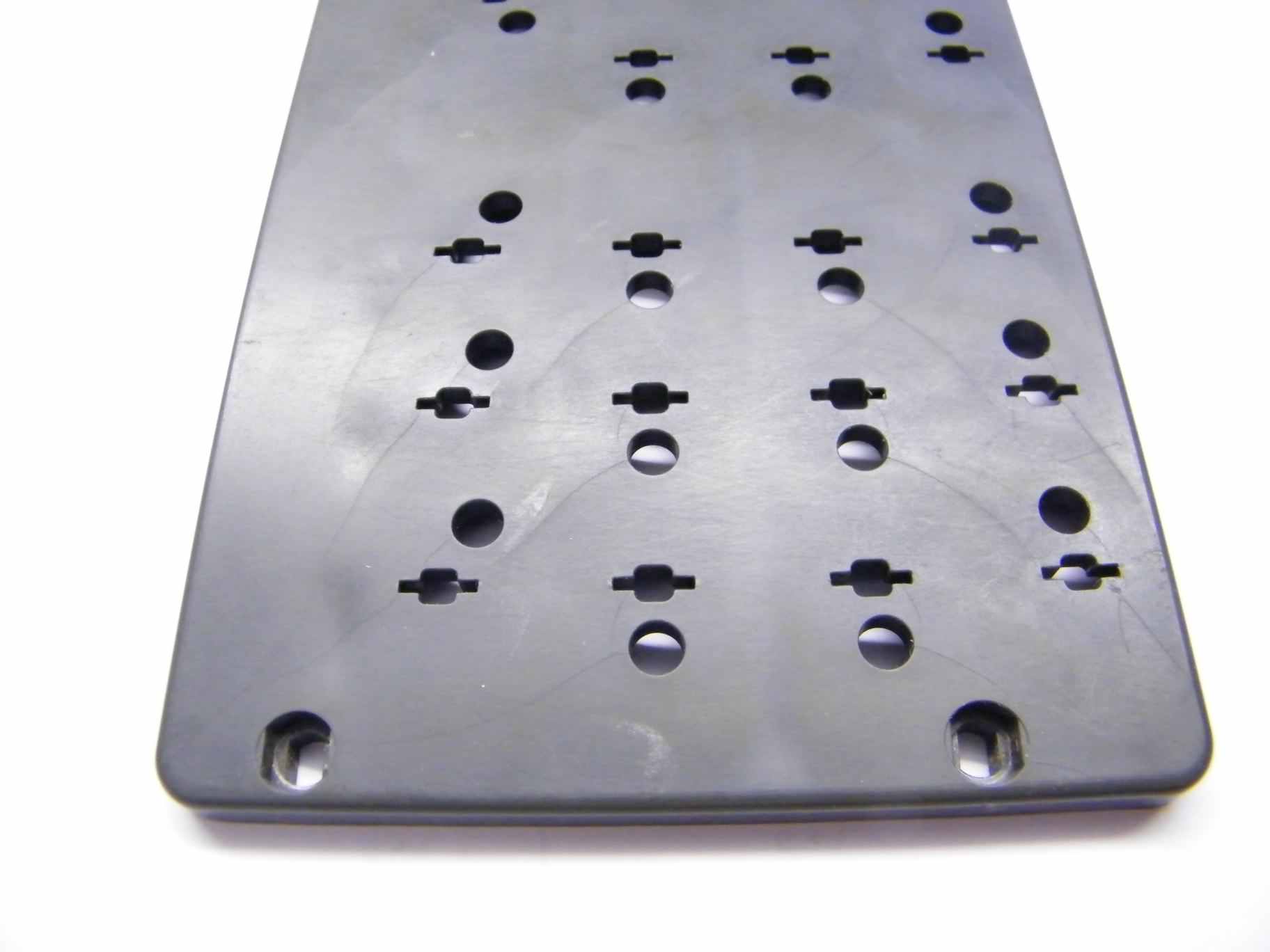 Stress fractures in a keyboard guide plate, click image for a larger version. &copy;2011 www.soemtron.org